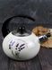 Чайник емальований зі свистком із чорною бакелітовою ручкою Kamille KM-1034 - 2,5 л, бежевий з малюнком "Лаванда"